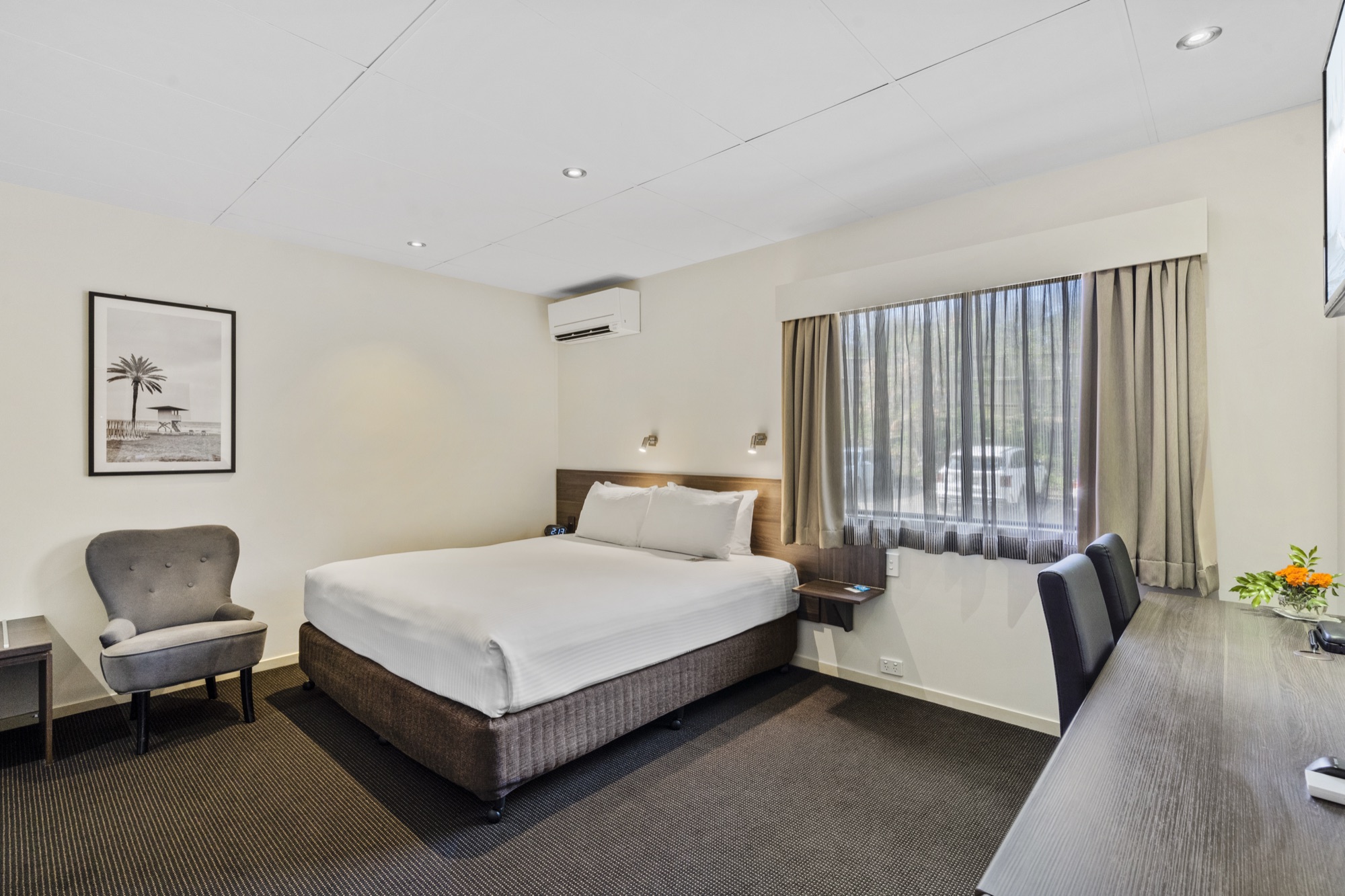 A calm garden-view guest room
